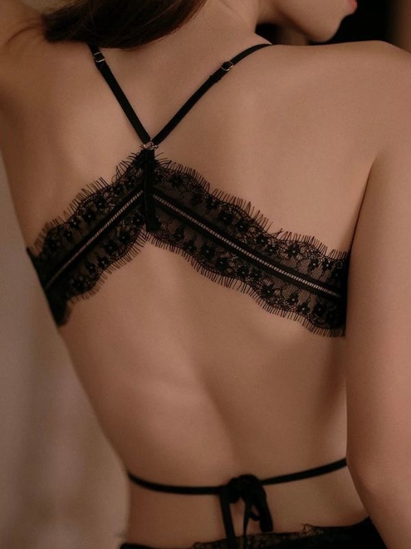 black lace bodysuit with open back crisscross lace strap