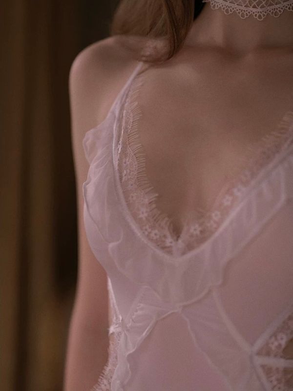 white sheer lace bodysuit with open back crisscross lace strap