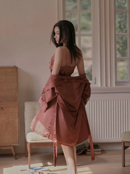 Woman in a brown robe and chemise