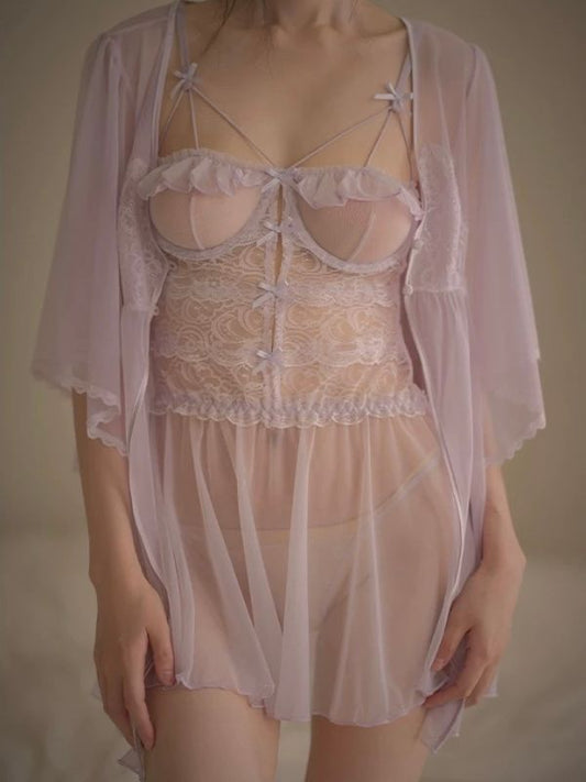 Lace lingerie set with sheer cover-up on a neutral background