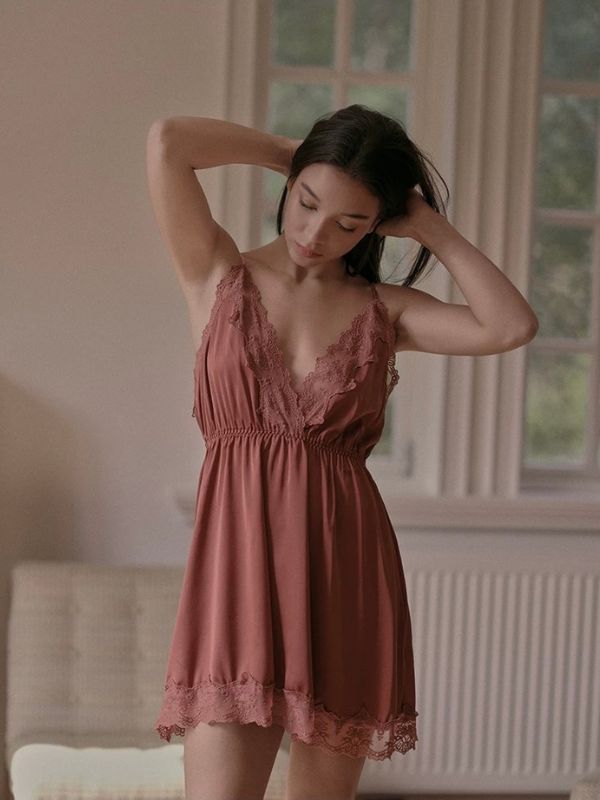 Woman in a brown satin chemise 