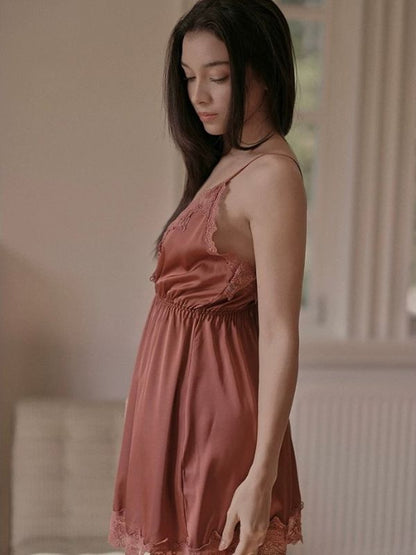 Woman in a brown satin chemise 