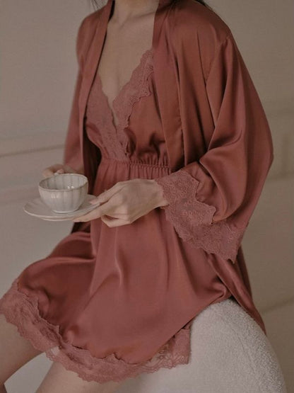 Woman in a brown satin chemise and robe