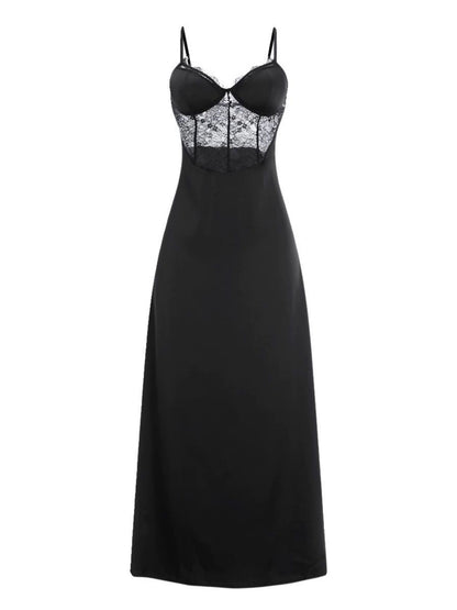 Black slip dress with lace detailing on a white background